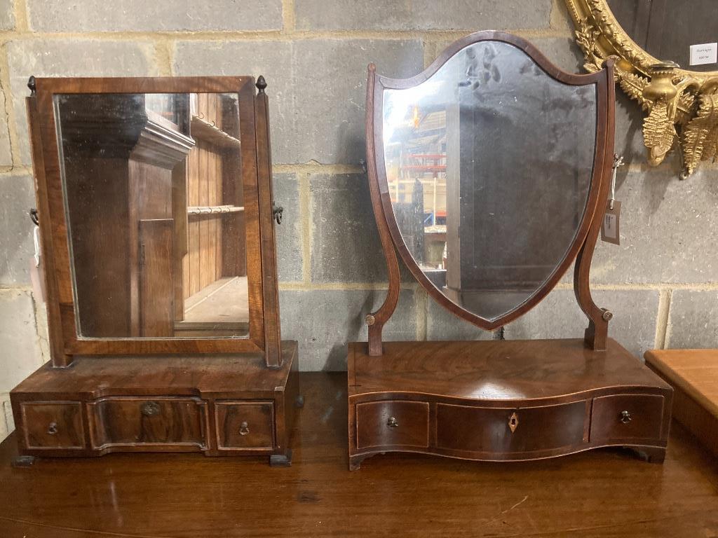 A shield-shaped mahogany toilet mirror with serpentine fronted box base and a walnut swing-frame toilet mirror, larger width 45cm, depth 22cm, height 60cm